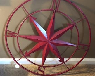 Large metal art wall compass.