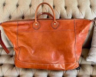 Item 94:  Leather Bag (Made in Italy - Carmel color) feat. wheels and strap to pull bag: $125