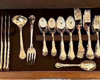 Item 249:  Godinger Gold Flash Silverware Set:    $95                                                     12 dinner forks, 12 salad forks, 12 knives, 12 teaspoons, 12 soup spoons, gravy ladle, 3 serving spoons, serving fork               