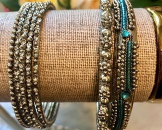 Item 220:  Set of (5) Silvertone Bangles with Tiny Rhinestones: $10                                                                                 Item 221:  Set of (2) Bangles - one with Blue Stones: $14