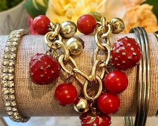 Item 222:  Stretchy Rhinestone Bracelet: $6                                                Item 223:  Strawberry Bracelet: SOLD                                                                Item 224:  Set of (3) Silvertone Bracelets: $14