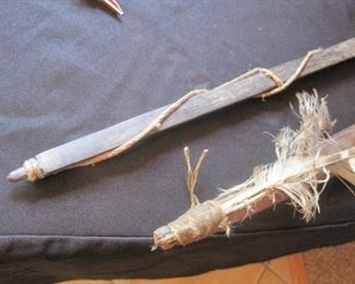 Authentic Native Indian Bows, one from the Pawnee Tribe. The feathers cannot be sold.