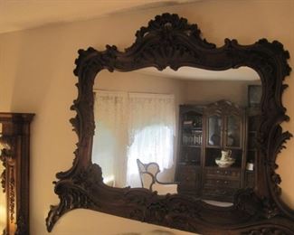 Heavily carved Mirror.