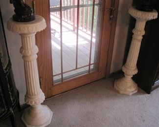 A pair of carved marble columns.