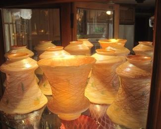 A set of 6 Quezal Glass Shades.