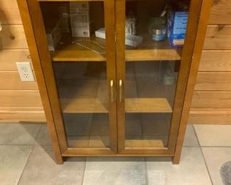 Wood cabinet with glass doors