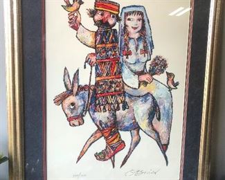 Okay, bride and groom on a donkey -- what home is complete without this??