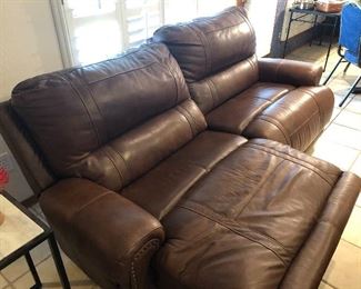 Double reclining brown leather couch, excellent condition! 