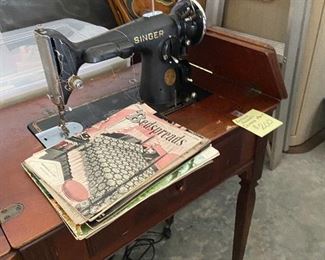 Antique Singer Sewing Machine in cabinet