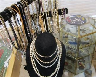 Beautiful costume jewelry - necklaces, rings, bracelets, pins, earrings, watches, knives, WW2 memorabilia & more.