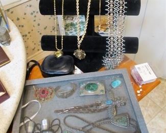 Beautiful costume jewelry - necklaces, rings, bracelets, pins, earrings, watches, knives, WW2 memorabilia & more.