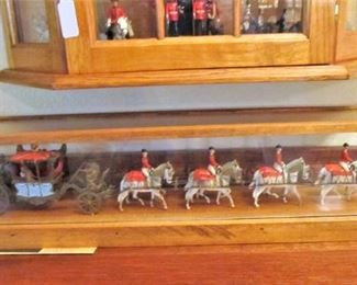 1950's British Coronation Carriage Reproduction in a glass case.