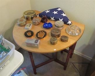 Beautiful antique dropleaf table & folded military flag.