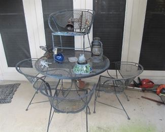 Look at this lovely mid-century patio set on castors.