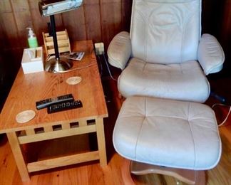 LEATHER CHAIR AND OTTOMAN $450