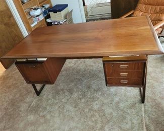 $900.00, MCM  B. J. Made in Denmark floating desk with sled legs excellent condition 60 x 31" 