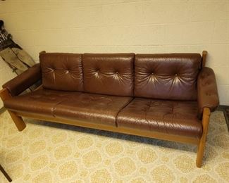 $400.00, 1965 MCM leather floating sofa, middle shows wear needs leather polish, VG condition