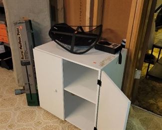 $10, white cabinet