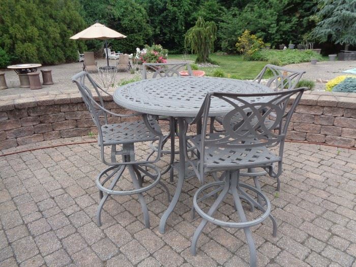 CAST ALUMINUM HIGH TOP WITH 4 SWIVEL  CHAIRS  $700.00