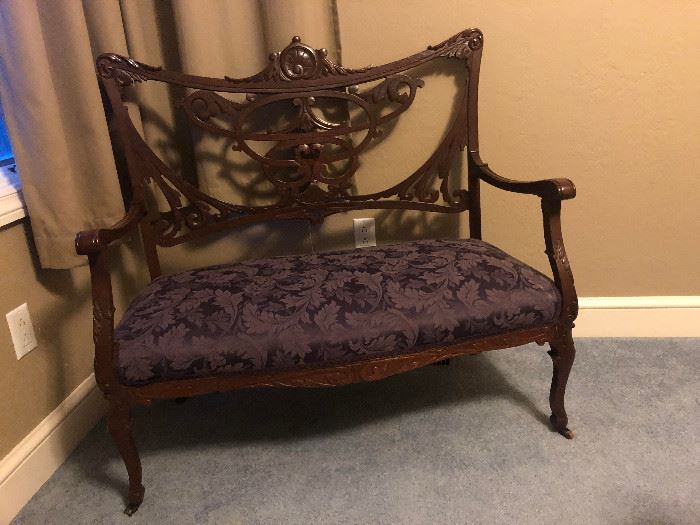 Intricate wood Victorian loveseat 