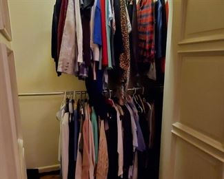Multiple closets of name brand clothing