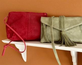 Women's leather handbags, assorted sizes.