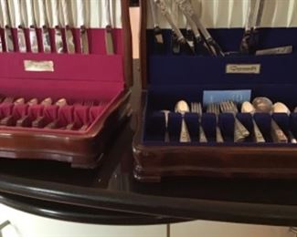 Two sets of silver plate flatware