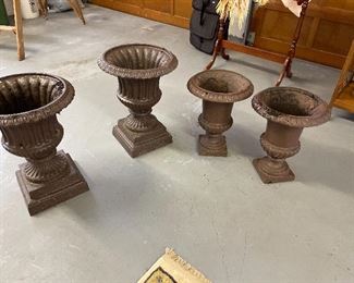 For cast-iron planters. Two large and two small