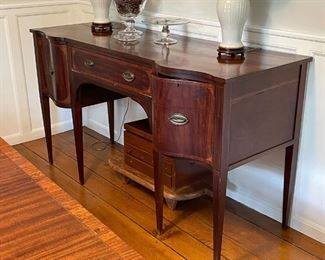 ANTIQUE REGENCY SIDEBOARD | flanked by serpentine-front drawers; h. 37 x 66 x 25 in. 