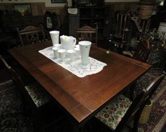 Dark Wood Dining Table with 5 Chairs - 2 Leaves store inside - Priced to Sell