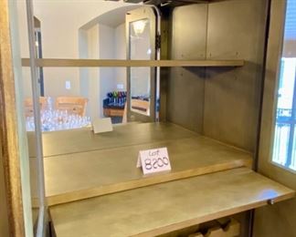 Lot 8200  $495.00 Seven Seas by Hooker, Wine Bar. 24 bottle holders, hanging glass rack, 1 drawer and 2 shelves. 