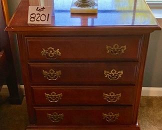 Lot 8201. $1795.00 American Drew Queen Bedroom Set. Includes: Queen Bed and Sealy Posturepedic Mattress (65" W x 88" L x 46" T), posts are 83" T, 2 night stands w/3 drawers (22"W x 15"S x 26"T); Chippendale Tallboy (38"W x 19"D x 84"T) 9 drawers and 1 pull (broken, but included).