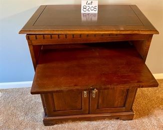 Lot 8205. $60.00. Swivel Top TV Cabinet with pull out component shelf, blemishes as shown. 27.5" L x 17" W x 31" T
