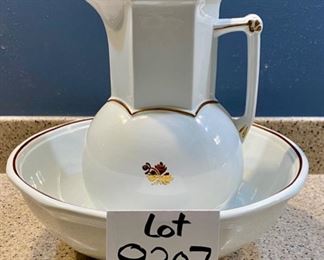 Lot 8207. $45.00 Antique Anthony Shaw & Son Bowl and Pitcher set. Bowl has a hairline crack, otherwise in good condiiton. Bowl: 14.5" diam and 5" T, Pitcher 11.5" T x 8" W