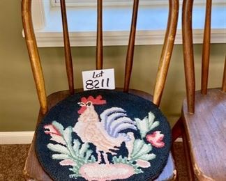 Lot 8211. $60.00 Pair of Antique Wood kitchen table dining chairs, one has an antique chair pad with a rooster motif. 16" W x 19.5" D x 34.5" T These chairs are super cute for decorating, holding plants, throw a quilt on it and hundreds of other ideas to give your home some personality!