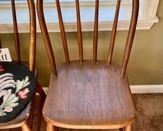 Lot 8211. $60.00 Pair of Antique Wood kitchen table dining chairs, one has an antique chair pad with a rooster motif. 16" W x 19.5" D x 34.5" T These chairs are super cute for decorating, holding plants, throw a quilt on it and hundreds of other ideas to give your home some personality!