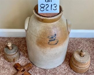 Lot 8213. $150.00 Antique Salt Glazed Butter Churn/Crock with lid and paddle bottom, appears to be a #3 in script on front, No Paddle Stick, and 2 antique wood butter molds/stamps 14" T x 10"diam. Normal Used Condition; displays great and very cool butter molds as well.