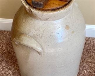 Lot 8213. $150.00 Antique Salt Glazed Butter Churn/Crock with lid and paddle bottom, appears to be a #3 in script on front, No Paddle Stick, and 2 antique wood butter molds/stamps 14" T x 10"diam. Normal Used Condition; displays great and very cool butter molds as well.