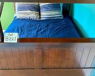 Lot 8221 $400.00. Very Cool Peligro Walnut Stain Bunk Bed (Twin Over Full) with complte Bedding and Ladder... 80" L x 74" T. 60" W and 45" W.