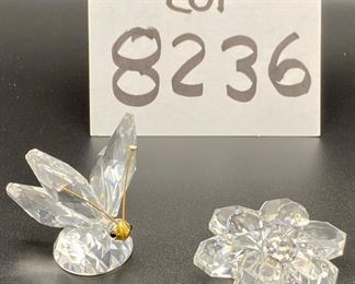 Lot 8236. $75.00. 2 Swarovski Crystal Figurines, a 2" butterfly and a floral cake stand (2 1/8" across)