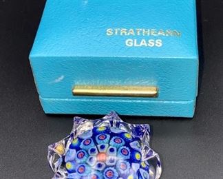 Lot 8237.$35.00 Vintage Strathearn Millefiori cane glass paperweight, made in Scotland (2"dia x 1 1/8"tall), with presentation box. Normal usage wear.