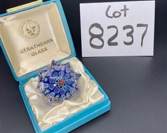 Lot 8237.$35.00 Vintage Strathearn Millefiori cane glass paperweight, made in Scotland (2"dia x 1 1/8"tall), with presentation box. Normal usage wear.
