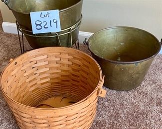 Lot 8219. $45.00 3 pcs Longaberger 1993 signed handled apple basket. 13" diam x 8" T and 2 brass pails. Brass pails measure 11" diam x 7" T and 13" diam x 8" T. also includes one metal brass colored stand.