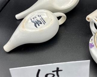 Lot 8252. $30.00 Lot of 6 vintage infant/hospital/invalid feeders. 1) Floral design, 2) Pearlescent glaze, 3) Homer Laughling stone china with crazing, 4) Marked 'Made in England', 5) cream color with smooth lines, 6) White with ribbed detail marked 'Paris, France'