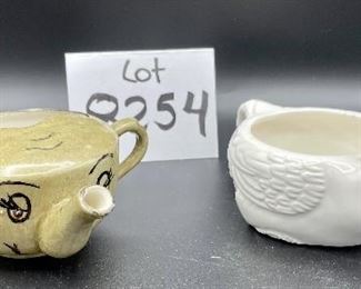 Lot 8254. $60.00 Lot of 8 side-handled infant/hospital/invalid feeders plus a cute duck shaped feeder that has a standard handle placement. 1) Gray, elephant snout feeder, 2) White duck with standard handle, 3) White, mini- side handle feeder, 4) cream colored - Royal Winton 'Made in England, 5) White, marked with an S under a crown made in Denmark, 6) white with a mark and #721, 7) marked #200 Schmid.