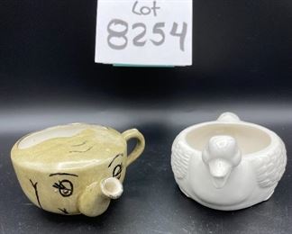 Lot 8254. $60.00 Lot of 8 side-handled infant/hospital/invalid feeders plus a cute duck shaped feeder that has a standard handle placement. 1) Gray, elephant snout feeder, 2) White duck with standard handle, 3) White, mini- side handle feeder, 4) cream colored - Royal Winton 'Made in England, 5) White, marked with an S under a crown made in Denmark, 6) white with a mark and #721, 7) marked #200 Schmid.