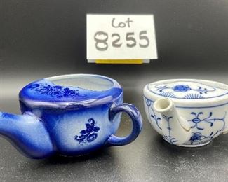 Lot 8255. $70.00. Lot of 7 side- handled infant/hospital/invalid feeders. All have a design and/or are colored in some way. 1) signed Vienna, Austria Edelweiss floral design,"Fur Genesung", which translates to "for recovery", 2) Cobalt blue color with floral images, 3) Purple violets, Vienna, Austria, 4) Pink rosebud design made in Victoria, Austria, 5) White with blue flower from London Covent Garden, 6) Lily of the Vally, marked #357, and 7) blue floral design embellishes the entire feeder cup.