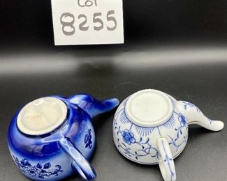Lot 8255. $70.00. Lot of 7 side- handled infant/hospital/invalid feeders. All have a design and/or are colored in some way. 1) signed Vienna, Austria Edelweiss floral design,"Fur Genesung", which translates to "for recovery", 2) Cobalt blue color with floral images, 3) Purple violets, Vienna, Austria, 4) Pink rosebud design made in Victoria, Austria, 5) White with blue flower from London Covent Garden, 6) Lily of the Vally, marked #357, and 7) blue floral design embellishes the entire feeder cup.