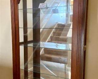 Lot 8262. $650.00. Curio Cabinet With 2-Way Sliding Door, and Glass Shelves - Beautiful Display for your Valuables and Collectibles. Manufactured by Illuminated Furniture. Made in the USA. 40"w x 12.5"d x 77.5"t