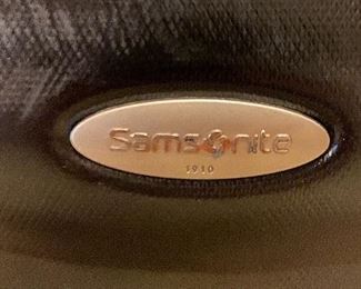 Lot 8268. $50.00. Two black, industrial hard-sided Samosonite TSA002, 4-wheeled suitcases. The smaller is a carry-on, They are pretty indestructible! 1) 15" W x 9" D x 24" T, 2) 18" W x 10" D x 28" T